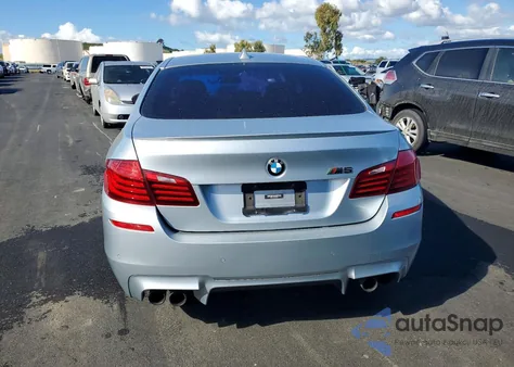 2015 BMW M5 z USA, uszkodzony, nr VIN WBSFV9C50FD594879